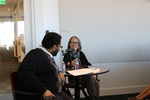 LMU faculty Brad Stone (left) speaks with Ruth Ozeki (right)